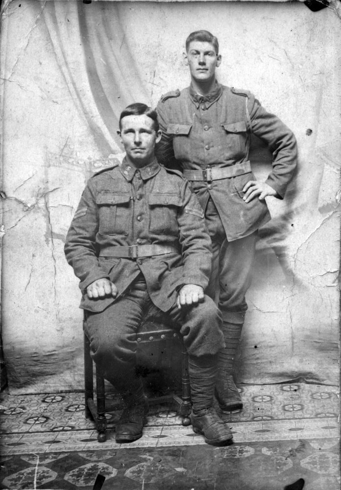 Bill Nielsen (standing) and Thomas Denbee (Carterton), both of 2nd Battalion, New Zealand Rifle Brigade, at Armentieres in June 1916. Denbee was killed soon after on 19 July.